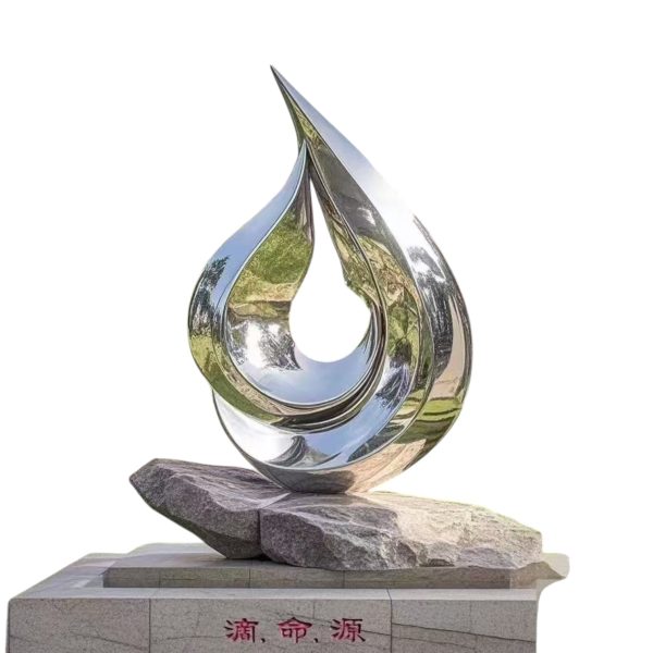 Stainless steel drop-shaped sculpture symbolizing growth