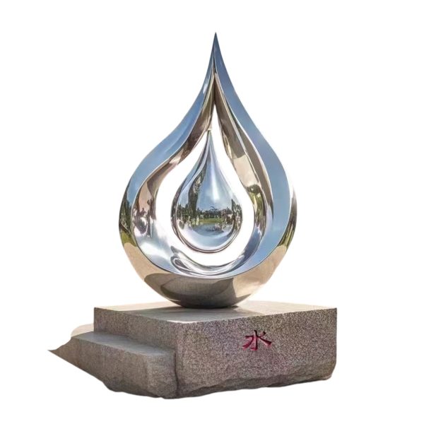 Stainless steel drop-shaped sculpture symbolizing growth