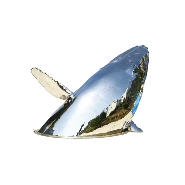 Stainless steel whale sculpture breaching from the ocean – outdoor public art