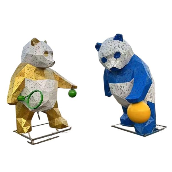 Blue and white geometric panda sculpture holding bamboo for outdoor display.