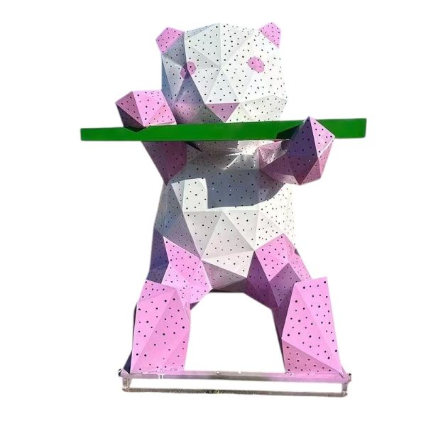 Blue and white geometric panda sculpture holding bamboo for outdoor display.