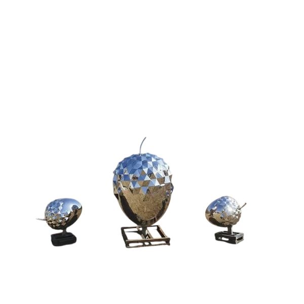 Stainless steel handbag sculpture with a polished mirror finish, ideal for fashion or art display.