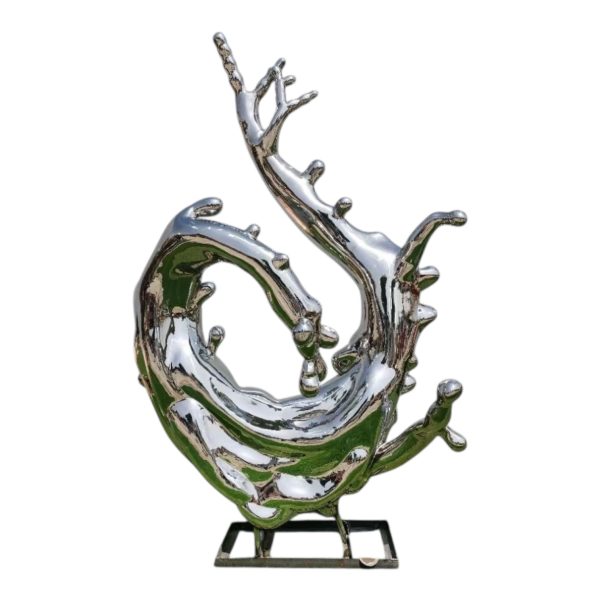 Modern stainless steel wave sculpture with mirror finish, inspired by ocean spray.