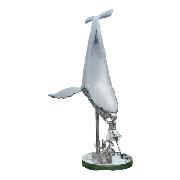 A stainless steel sculpture of a whale interacting with a little girl, polished to a mirror finish, suitable for outdoor display.