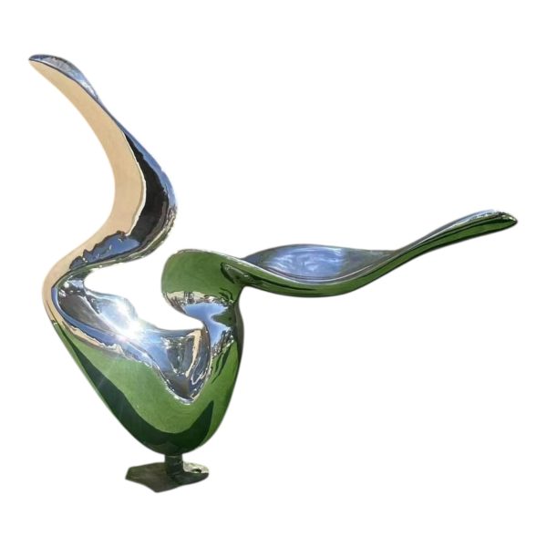 Abstract stainless steel ribbon sculpture with flowing curves and mirror finish for outdoor decoration.