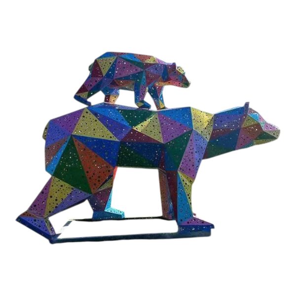 Colorful geometric stainless steel polar bear sculpture with polygonal surfaces.