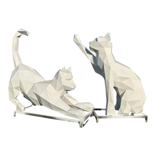 Two stainless steel geometric cat sculptures in playful poses for modern decoration.
