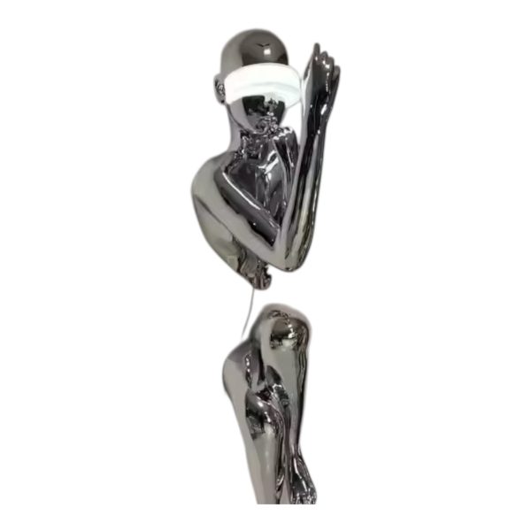 Contemporary stainless steel figure sculpture with reflective finish, designed for art installations. ﻿