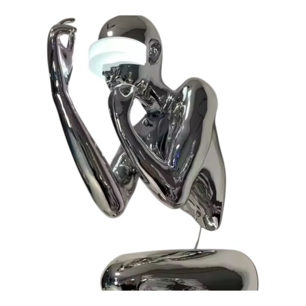 Contemporary stainless steel figure sculpture with reflective finish, designed for art installations. ﻿