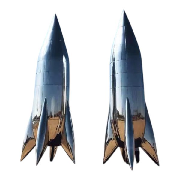 Stainless steel rocket sculptures with a smooth, polished surface and pointed tops
