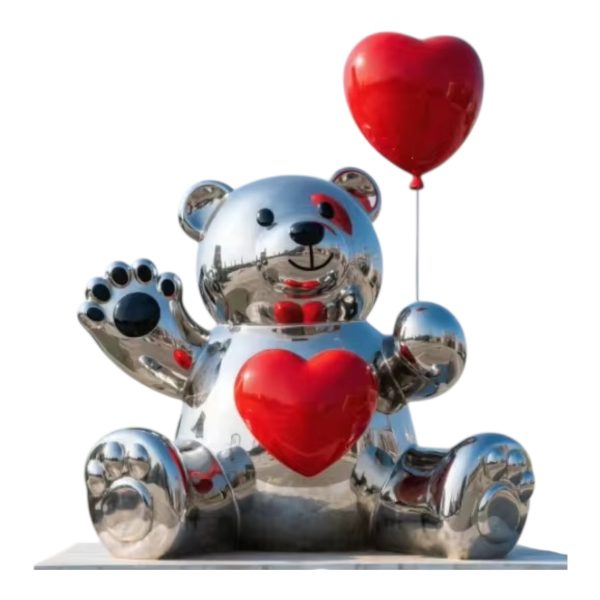 Stainless steel bear sculpture holding a red heart-shaped balloon